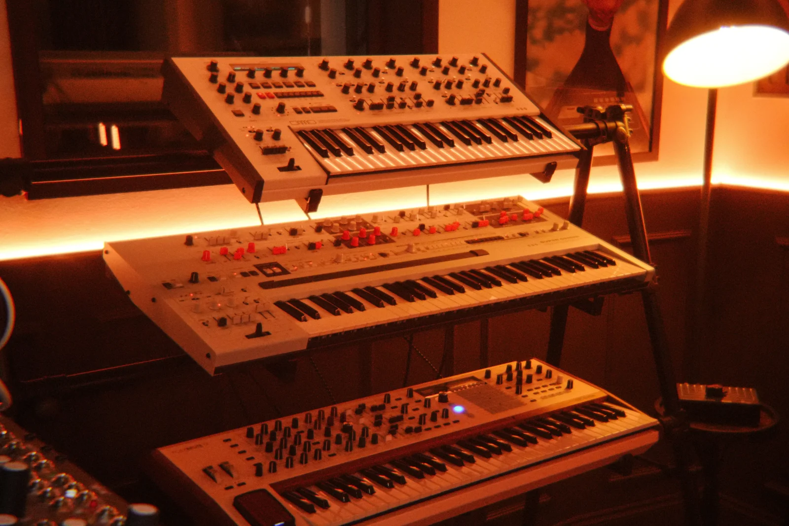 Analog keyboards in warm studio light